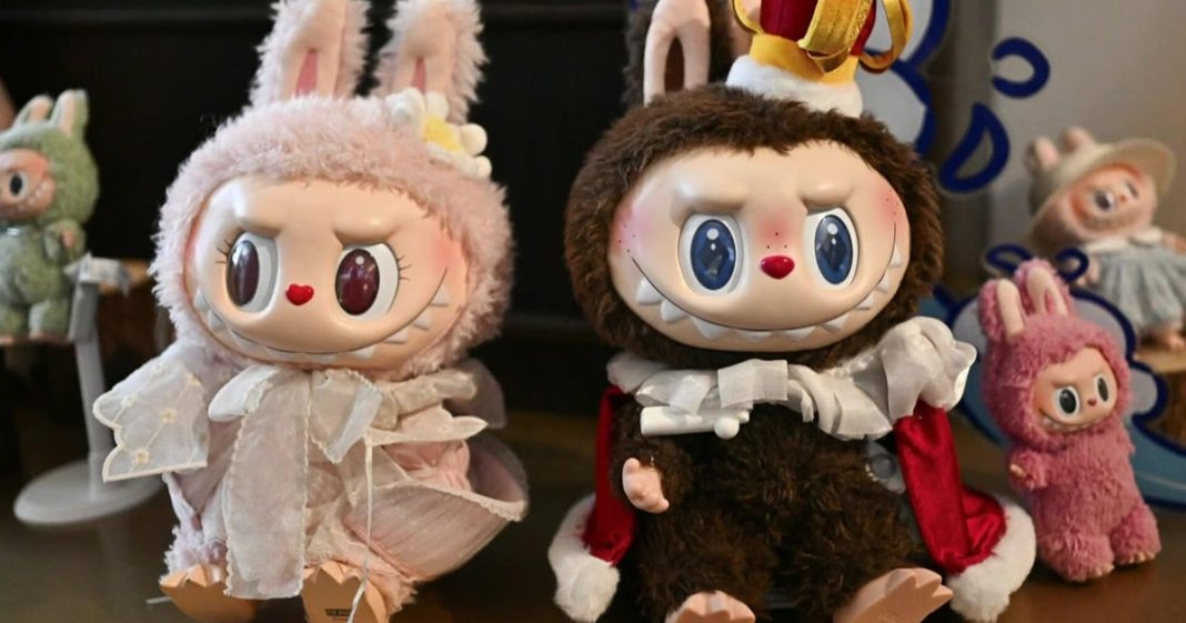 Bezos wedding guest gifts viral Labubu doll